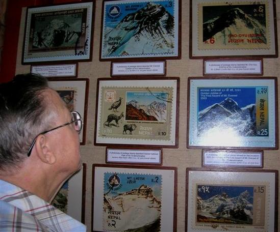 museum stamp collection featuring himalayas